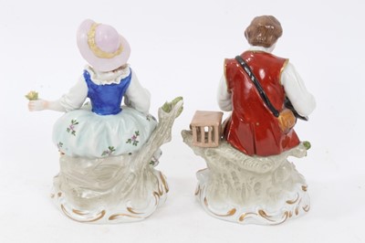 Lot 122 - Six pairs of Sitzendorf porcelain figures, mostly with floral encrusted scrollwork bases, printed marks, between 11cm and 19cm height