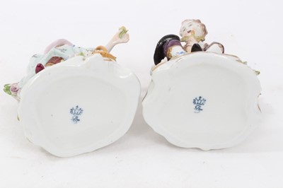 Lot 122 - Six pairs of Sitzendorf porcelain figures, mostly with floral encrusted scrollwork bases, printed marks, between 11cm and 19cm height