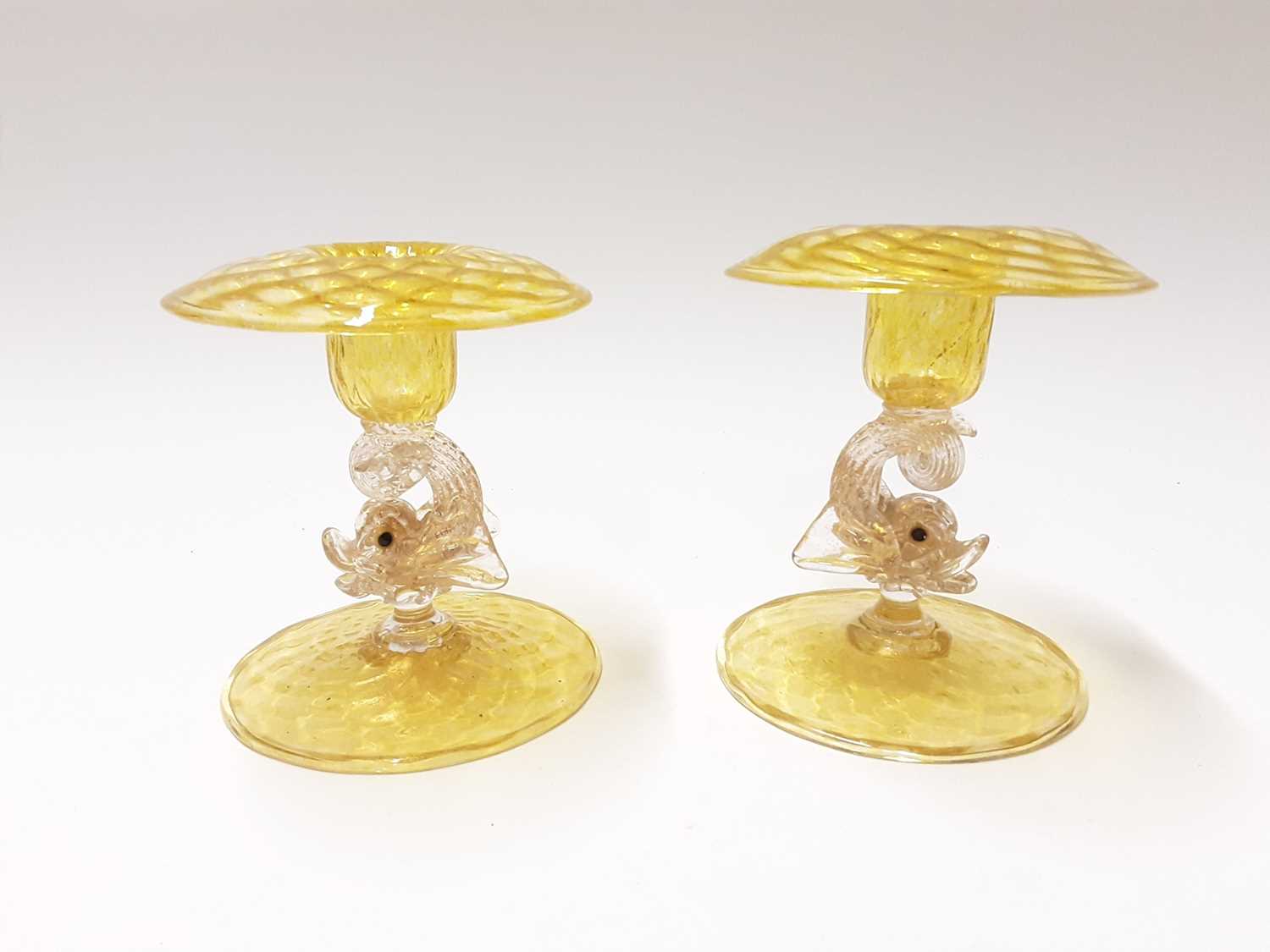 Lot 213 - Two good quality Murano Venitian yellow glass dolphin candlesticks