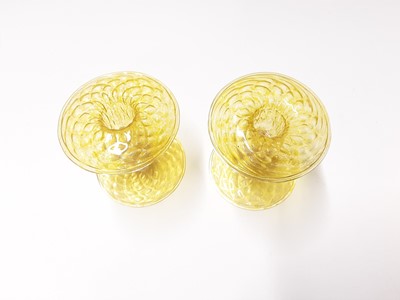 Lot 366 - Two good quality Murano Venitian yellow glass dolphin candlesticks