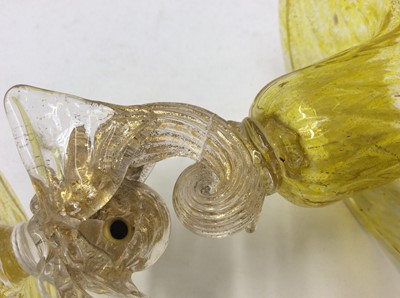 Lot 213 - Two good quality Murano Venitian yellow glass dolphin candlesticks