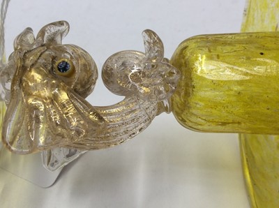 Lot 366 - Two good quality Murano Venitian yellow glass dolphin candlesticks