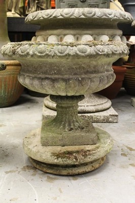 Lot 861 - Two concrete garden urns
