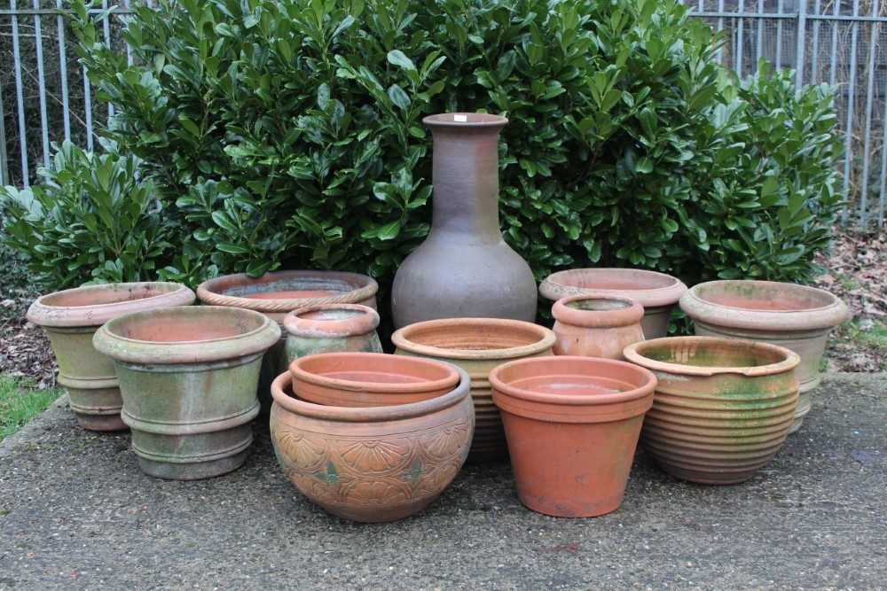 Lot 862 - A collection of terracotta garden pots (13)