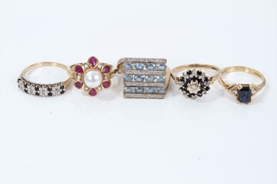 Lot 341 - Group of five 9ct gold and gem-set rings to include ruby and cultured pearls cluster ring, blue topaz and diamond cluster ring and three sapphireand diamond rings