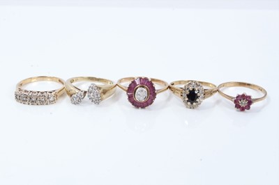 Lot 342 - Group of five 9ct golds and gem set rings to include two diamond set rings, two ruby and diamond rings and a sapphire and diamond cluster ring