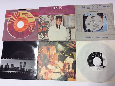 Lot 1066 - Schweppes wooden box containing an eclectic range of approximately 150 single records including George Harrison, Ringo Starr, Dick Jordan, Badfinger, Elvis (colour vinyl), Immaculate Fools, Jerry W...