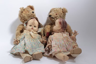 Lot 1641 - Two mohair teddies with amber eyes and rexine pads plus two Pedigree dolls