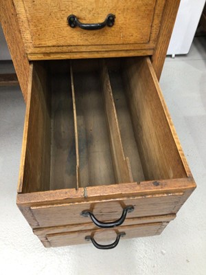 Lot 193 - 20th century oak kneehole with seven drawers