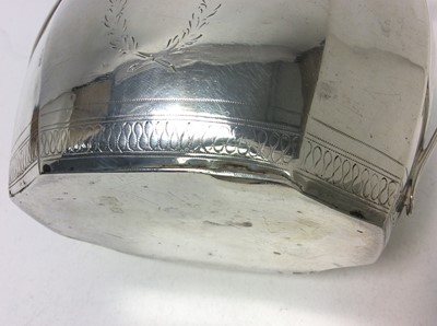 Lot 215 - Georgian Scottish Provincial silver twin handled sugar bowl of faceted octagonal form, with bands of bright cut decoration, reeded borders and an engraved armorial crest. Maker's mark only WS, poss...