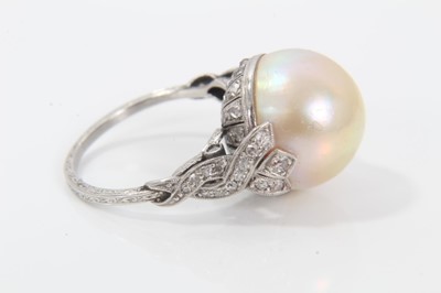 Lot 320 - Cultured pearl and diamond ring with a 13mm diameter pearl (not tested for natural origin) in platinum setting with rose cut diamonds and pierced back with diamond woven shoulders on engraved shank...