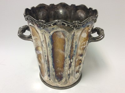 Lot 228 - Silver plated wine cooler of cylindrical form with fluted decoration, scroll border, twin scroll handles and beaded decoration to foot, marked to base- Derby Silver Co. Quadruple Plate 1807, 28.8cm...