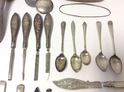 Lot 232 - Victorian silver butter knife with engraved decoration and mother of pearl handle, (Sheffield 1898), together with another Victorian silver butter knife (Birmingham 1899) and group of silver and wh...