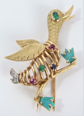Lot 280 - 1960s French 18ct gold and multi-gem novelty brooch in the form of a running duck, the the textured gold and wire work body scattered with diamonds and precious stones, the double pin fitting engra...