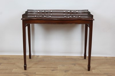 Lot 977 - George III style mahogany silver table