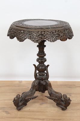 Lot 984 - 19th century Burmese carved padouk occasional table