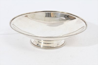 Lot 265 - George VI silver dish of shallow circular form with beaded border, on splayed circular foot, also with beaded border, (Sheffield 1943), maker James Dixon & Sons, all at 9oz, 16.3cm in diameter