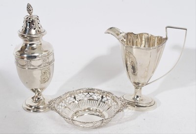 Lot 268 - Edwardian silver bon bon dish of shaped circular form with pierced decoration and twin ribbon handles (Birmingham 1909), together with an Edwardian silver sugar caster, (Birmingham 1905) and a Geor...