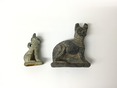Lot 511 - Ancient Egyptian amulet of Bastet in cat form, c.1000-332 BC, and a 19th/20th century Egyptian Grand Tour cat amulet, the largest measuring 4.25cm height