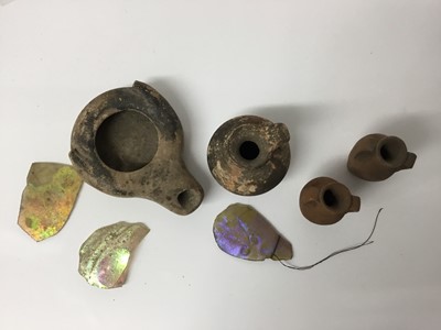 Lot 516 - Roman items, including an oil lamp and flagon, a tiny amulet of Jasper, and some items possibly later, including two amphora and three iridescent glass shards