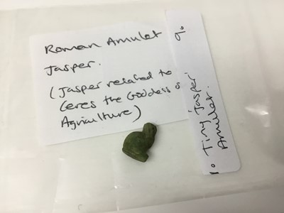 Lot 516 - Roman items, including an oil lamp and flagon, a tiny amulet of Jasper, and some items possibly later, including two amphora and three iridescent glass shards