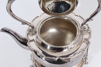 Lot 260 - Early 20th Century Silver plated spirit kettle of cauldron form, with domed cover with ebony finial and handle, separate stand raised on four paw feet and, makers mark to base 'Alexander Clark Comp...