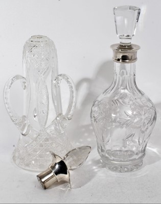 Lot 280 - Elizabeth II cut glass decanter with silver collar, (Birmingham 1969), maker C. J. Vander Ltd, 29.5cm in overall height, together with another cut glass decanter with silver mount (top broken) (2)