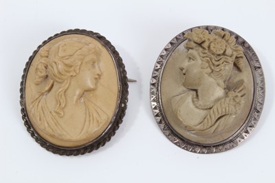 Lot 336 - Two late 19th century Italian carved lava cameos depicting classical female busts, one titled to the reverse 'Psiche', both in silver brooch mounts, approximately 36mm x 30mm