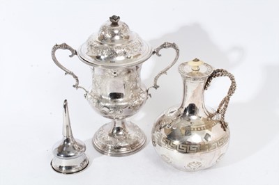 Lot 64 - Victorian silver plated two handled trophy cup and cover of campana form with embossed and chased decoration and twin scroll handles together with a Victorian Greek Revival silver plated jug and an...