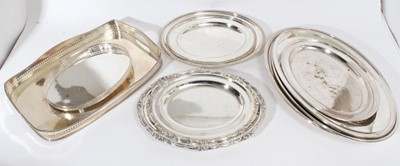 Lot 294 - 20th Century silver plated gallery tray of rectangular form with pierced border together with a group of other silver plated trays and serving plates (qty)