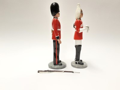 Lot 23 - Two Royal Doulton figures - The Guardsman HN2784 and The Lifeguard HN2781