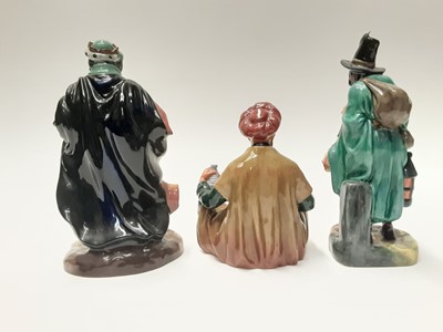 Lot 30 - Three Royal Doulton figures - The Mask Seller HN2103, Omar Khayyam HN2247 and Good King Wenceslas HN2118
