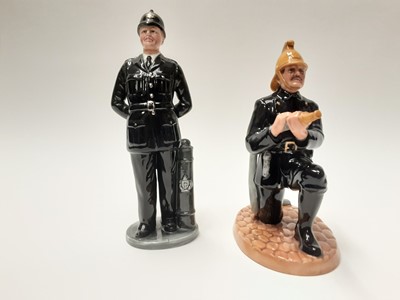 Lot 41 - Two Royal Doulton figures - The Bobby HN2778 and Fireman HN4411