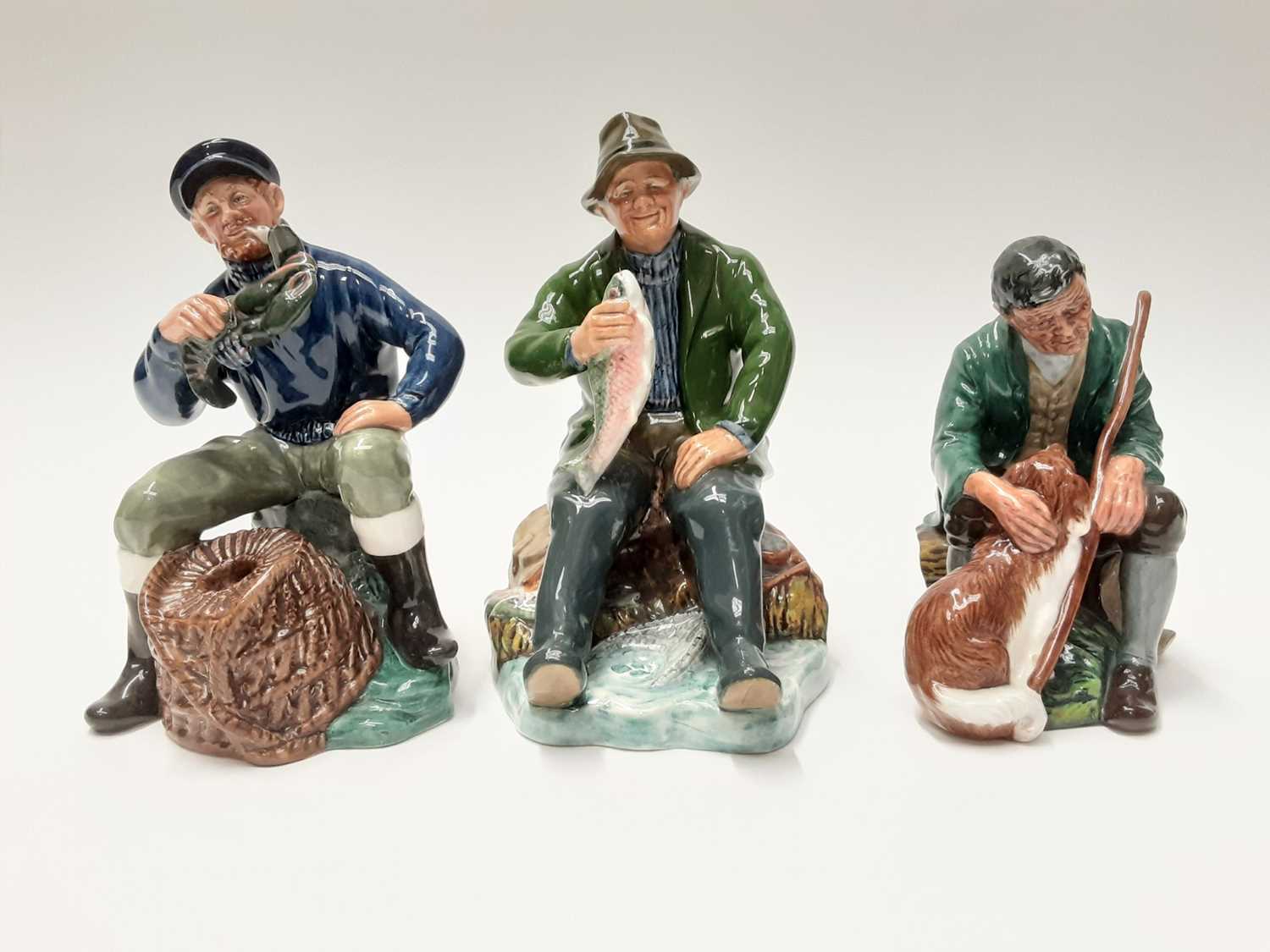 Lot 46 - Three Royal Doulton figures - A Good Catch HN2258, The Master HN2325 and The Lobster Man HN2317