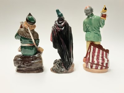 Lot 47 - Three Royal Doulton figures - The Pied Piper HN2102, Robin Hood HN2773 and Punch and Judy Man HN2765
