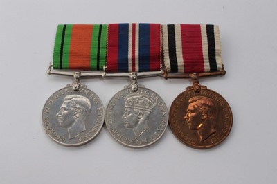 Lot 606 - Second World War medal trio comprising Defence, War and Special Constabulary Long Service medal, named to John Drury (mounted on bar)