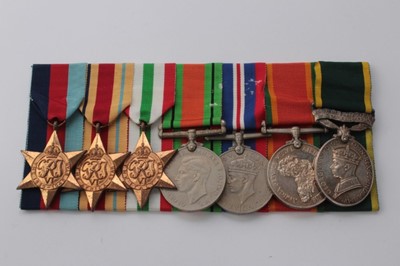 Lot 608 - Second World War and later medal group comprising 1939 - 1945 Star, Africa Star, Italy Star, Defence, War and Africa Service medals named to 35415 G.A. Moultris, together with a George VI Territori...