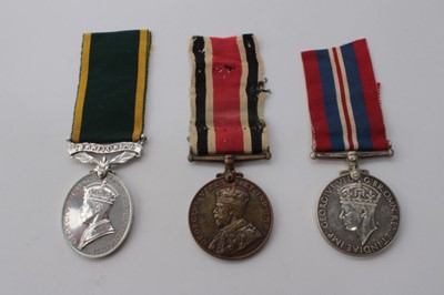 Lot 610 - George V Special Constabulary Long Service medal named to Samuel Booth, together with a Second World War War medal and a George VI Territorial Efficiency medal named to 72581 SJT. C. N. Hooker. R.E...