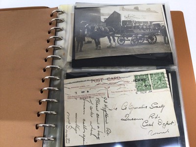 Lot 753 - Postcards in album mainly real photographic cards including Norwich Co-operative Society horse and cart, Military ambulance with patient and soldiers, shop front Norwich,  Fire Brigade Thetford, st...