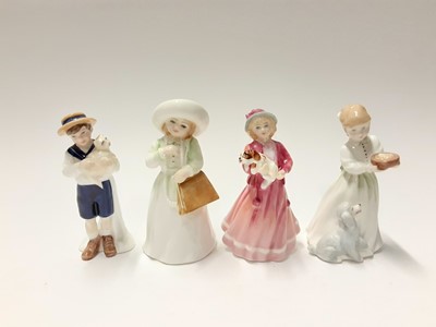 Lot 86 - Eight Royal Doulton figures - On The Beach HN3877, Picnic HN2308, My First Figurine HN3424, Almost Grown HN3425, Home At Last HN3697, Dinnertime HN3726, Special Friend HN3607 and A Child from Willi...