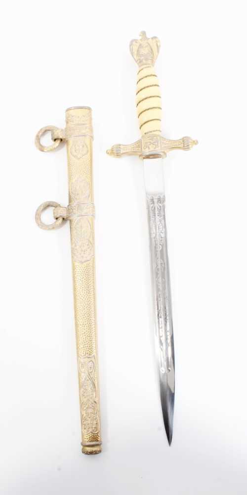Lot 945 - Fine Second World War Nazi 1938 pattern Kreigsmarine Dress Dagger with etched polished steel blade by E.U.F Horster Solingen, wire bound cream celluloid grip and scarce, ornately decorated gilded s...