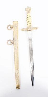 Lot 945 - Fine Second World War Nazi 1938 pattern Kreigsmarine Dress Dagger with etched polished steel blade by E.U.F Horster Solingen, wire bound cream celluloid grip and scarce, ornately decorated gilded s...