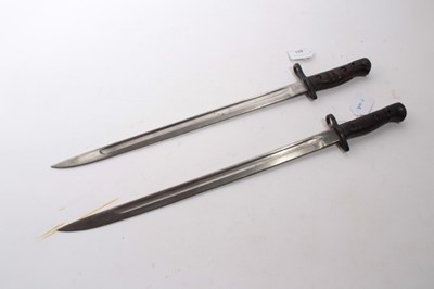 Lot 851 - First World War British 1907 pattern bayonet by Wilkinson, together with an American 1917 pattern Remington Bayonet, both lacking scabbards (2)