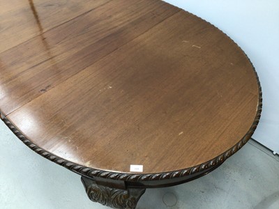 Lot 108 - 1920s mahogany extending dining table
