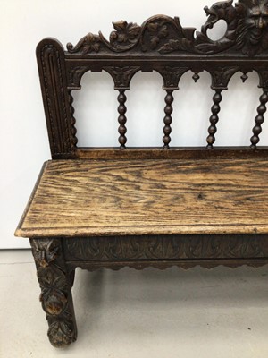 Lot 113 - 19th century carved oak bench