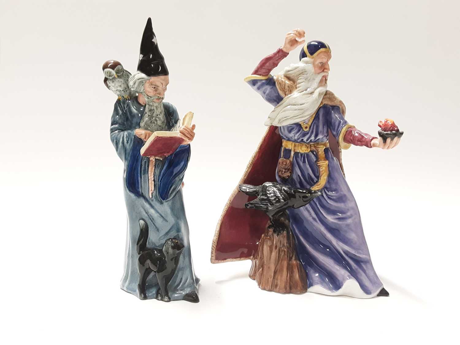 Lot 131 - Two Royal Doulton figures - The Sorcerer HN4252 and The Wizard HN2877