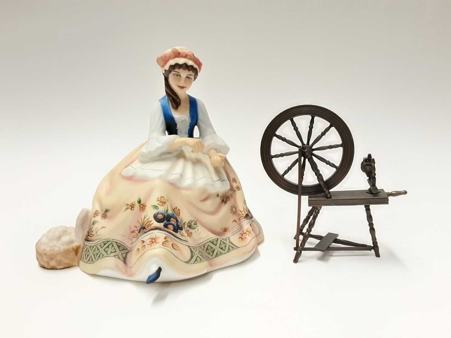 Lot 135 - Royal Doulton limited edition Gentle Arts figure - Spinning HN2390 on plinth base, modelled by Peggy Davies, number 429 of 750, boxed with certificate