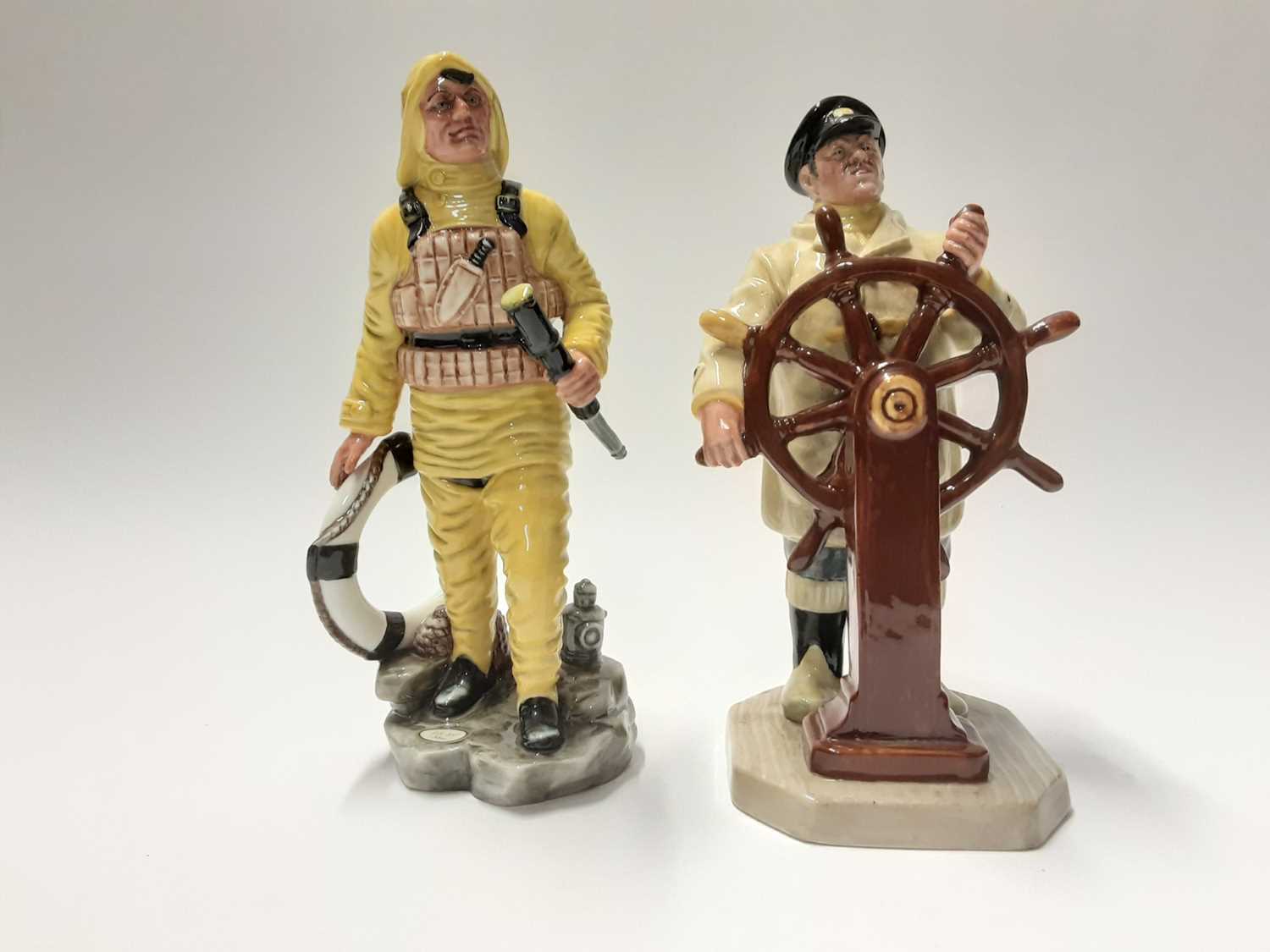 Lot 140 - Two Royal Doulton figures - The Lifeboatman HN2764 and The Helmsman HN2499