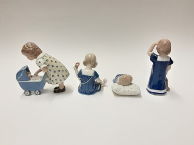 Lot 150 - Four Royal Copenhagen porcelain figures including girl with pram and girl with Teddy bear, model numbers 675, 673, 676 and 407