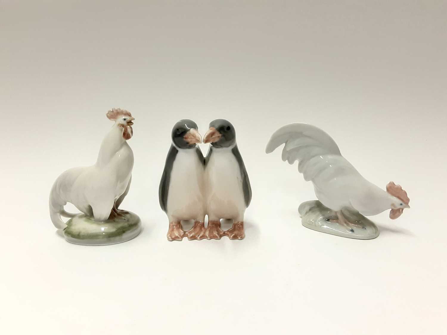 Lot 152 - Three Royal Copenhagen porcelain ducks, model numbers 064, 364 and 363, plus penguins number 160 and two Cockerells number 1127 and 1126